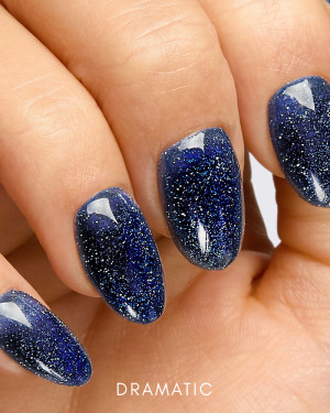 Navy blue gel polish with blue and silver glitter