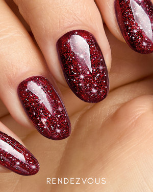 Deep burgundy gel polish with red and gold flashing glitter