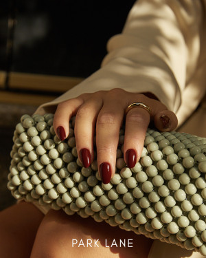 Glossy reddish brown gel polish