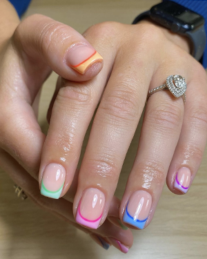 Rainbow French tip pride nails